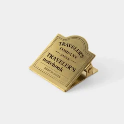 Traveler's Company | Clip Brass Traveler Logo